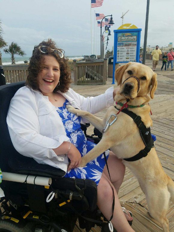 Abigail Morrison with her companion dog