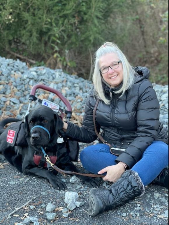 Laurie with her companion dog Gilbert